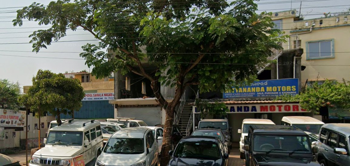 Nityananda Motors used car gallery on Puri Bypass Road Rasulgarh with cars parked outside